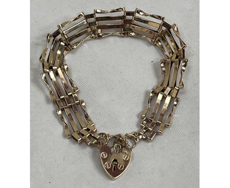 A 9ct gate link locket bracelet. 9g