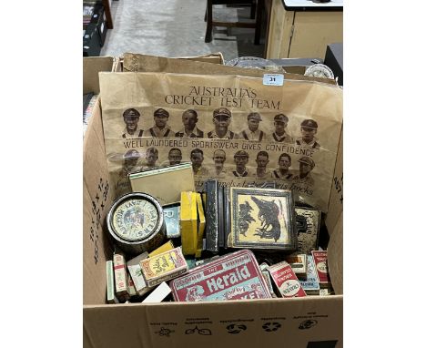 A box of vintage tins and packets