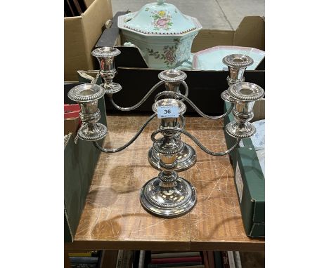 A pair of plated three light candelabra. 12" wide x 10½" high