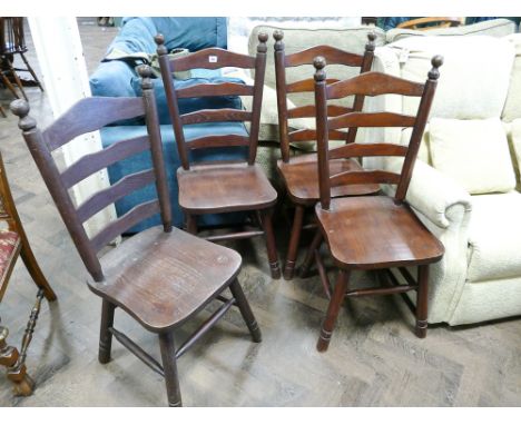 Set of four heavy oak ladder back style dining chairs with panel seats 
