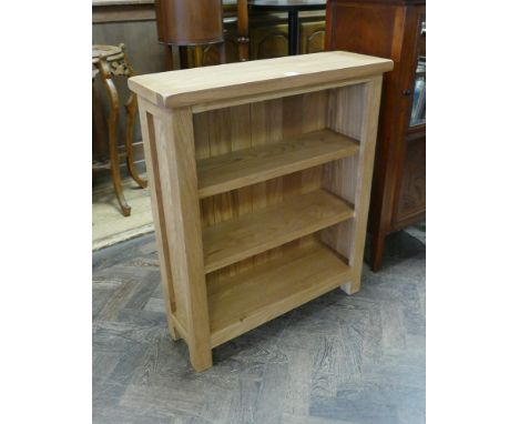 Heavy light oak low open bookcase
