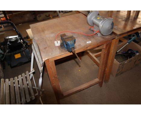 A work bench with vice and Black & Decker bench grinder 