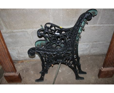 A pair of ornate bench ends 