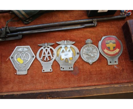 A quantity of car badges to include AA; Lucas etc