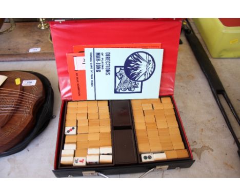 A leather cased Mahjong set