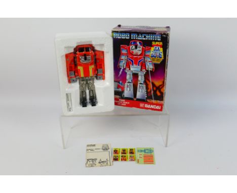 Bandai - A boxed vintage Bandai #0305509 Robo Machine 'Super Go Bots' Stacks. The model  appears to be in Mint condition sitt