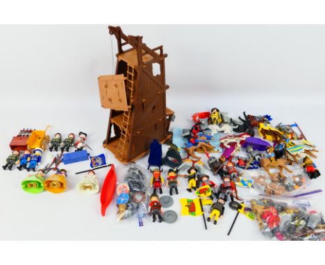 Playmobil - A collection of unboxed vintage Playmobil accessories and figures. Lot includes #3887 Seige Tower; Knights; Horse