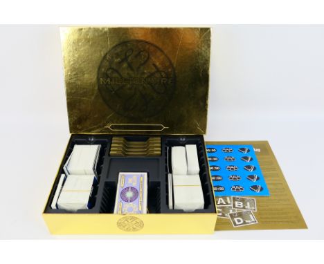 Celador - A boxed 'Limited Gold Edition' Who Wants to be a Millionaire Game. The game appears to be in Mint condition contain
