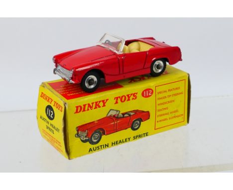 Dinky - A boxed Austin Healey Sprite # 112. The car appears Near Mint with just a couple of minor marks, the box is Very Good