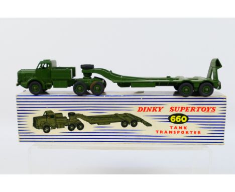 Dinky - Supertoys - A boxed Thorneycroft Mighty Antar Tank Transporter # 660. The model appears in Very Good condition with s