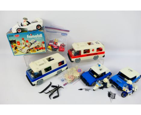 Playmobil - A collection of vintage Playmobil accessories and sets. Lot includes a boxed Playmobil #3520 Racing Car; Ambulanc