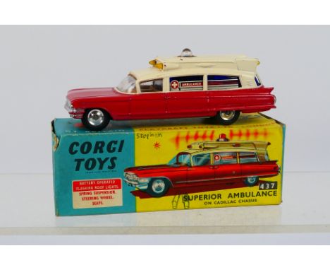 Corgi - A boxed Cadillac Superior Ambulance # 437. The model appears little used but has some corrosion marks possibly from a