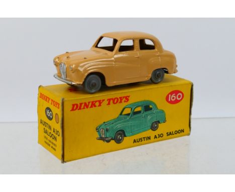 Dinky - A boxed Austin A30 saloon # 160. The model appears in Very Good condition with only light marks to some raised edges.