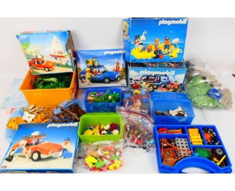 Playmobil - A collection of five boxed vintage Playmobil sets, with a large quantity of unboxed Playmobil accessories / spare