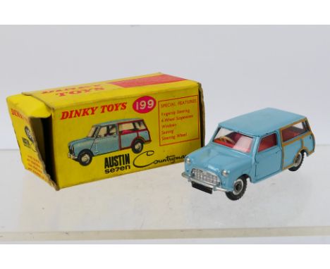 Dinky - A boxed Austin Se7en Countryman in light blue # 199. The car appears Near Mint with some very minor marks. The box is