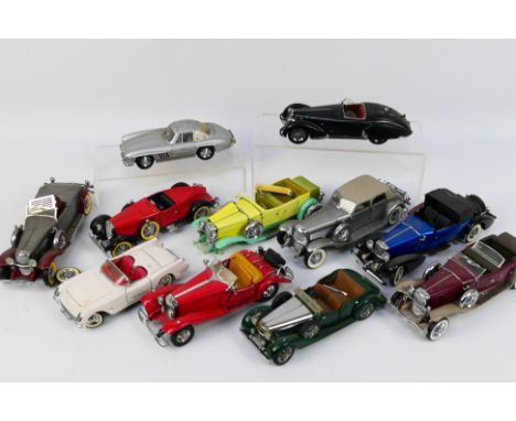 Franklin Mint - An unboxed group of playworn diecast model cars in various scales from Franklin Mint. Lot includes Limited Ed