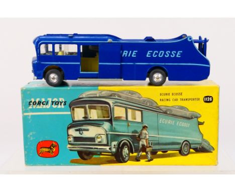 Corgi Major Toys - A boxed Ecurie Ecosse Commer Racing Car Transporter # 1126. This one is in dark blue metallic with the lig