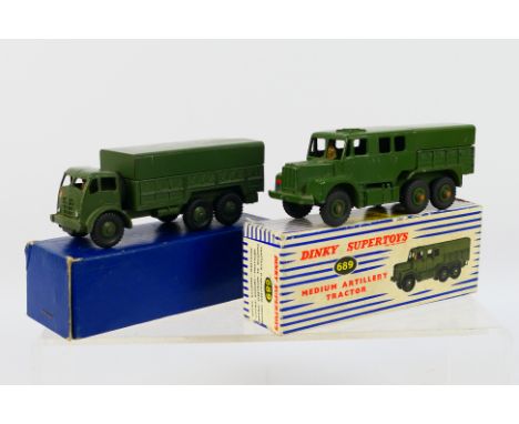 Dinky Supertoys - 2 x Military models, Medium Artillery Tractor # 689 and Foden 10 Ton Truck # 622. They show signs of light 