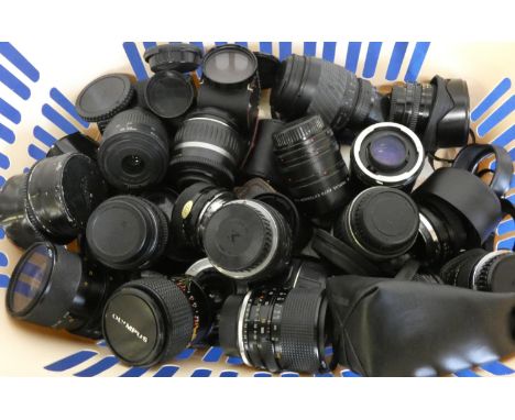 A collection of camera lens, to include Hoya, Olympus, Sigma, Pentax and Canon, approximately 25. 