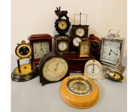A Smiths white painted metal timing clock, a Smiths bakelite mantle clock, together with carriage, and anniversary clocks. 