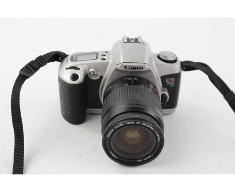Canon EOS 500N SLR Film Camera w/ Canon EF 28-80mm F/3.5-5.6 Lens  This camera is WORKING &amp; in good condition Tested with