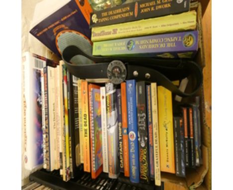 Grateful Dead pop memorabilia to include books, CD's, belt and concert ticket.