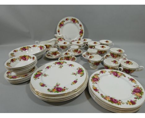 A bone china Old Country Rose style part dinner service for 6 place settings, to include dinner, side and tea plates, 4 x tea