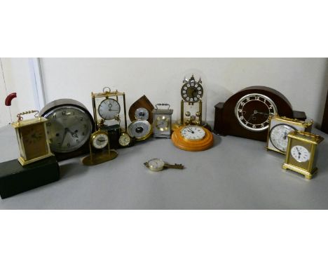 A Kundo electromagnetic mantle clock, together with a anniversary dome table clock, a Westminster chime mantle clock, carriag