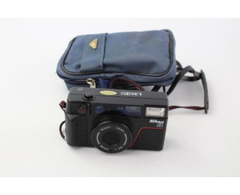 Nikon L35 AF2 Compact Film Camera Nikon 35mm F2.8 Lens w/ Case  This camera is WORKING &amp; in a good condition Tested with 