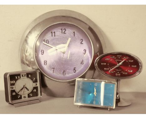 A 1950s/60s manual wind alarm clock, red plastic body with chrome stand &amp; bezel, 8.5 cm tall, together with a retro style