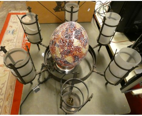 A six branch wrought iron ceiling light together with a multi-coloured egg shaped ceiling light.(2) 