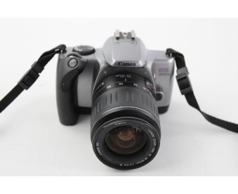 Canon EOS 3000V SLR Film Camera w/ Canon EF 28-90mm F/4-5.6 III Lens  This camera is WORKING &amp; in good condition Tested w