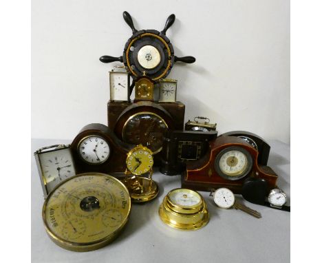 A collection of carriage and mantle clocks to include, a Smiths bakelite clock case, and a wall barometer in the form of a sh