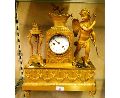 A 19th century French gilt metal mantle clock, the central white faced dial between angel figure with bow and torch and a fla