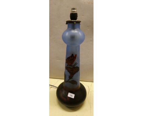 An art nouveau style table lamp. 55cm tall.