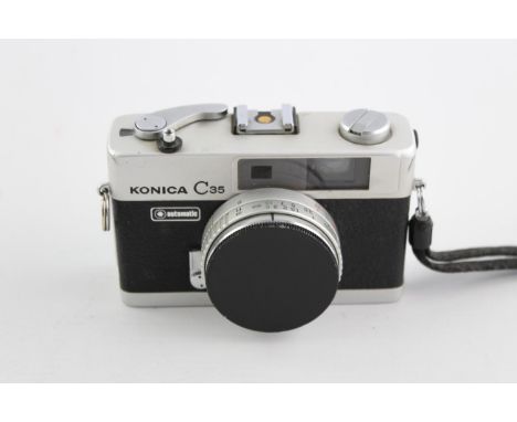 Konica C35 Automatic Range Finder Camera Konica Hexanon 38mm F/2.8 Lens   This camera is WORKING and in a good condition Wind