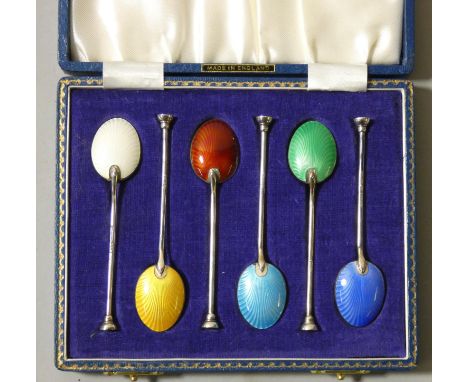A silver and guilloche enamel set of six coffee bean spoons, Birmingham 1965, case. 