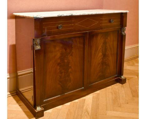 A MAHOGANY MARBLE TOP CUPBOARD, after Thomas Hope, with one long drawer over double panel doors with Egyptian figures. 4ft lo