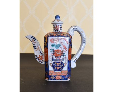 A JAPAN PATTERNED TEAPOT AND COVER. 7.5ins high.