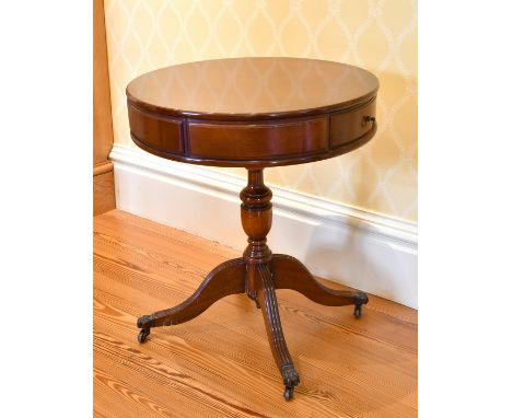 A REPRODUCTION MAHOGANY SMALL CIRCULAR TOP DRUM TABLE with two drawers, on a centre pillar and quadruple curving legs. 1ft 7i