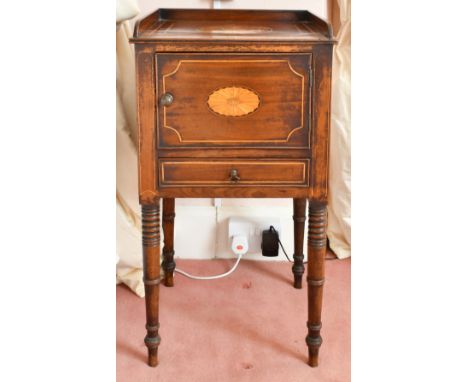 A MAHOGANY BEDSIDE CUPBOARD with drawer and panel door, on turned legs. 1ft 3ins diameter.