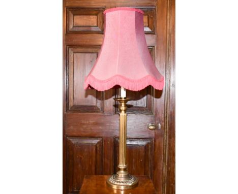 A GOOD BRASS LAMP AND SHADE.
