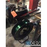 Signode portable strapping machine with plastic strap