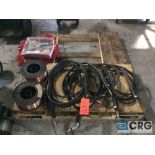 Lot of welding guns, wire and curtains