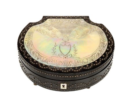 A fine early 19th century Palais Royal ebony and cut Tula steel nécessaire, the hinged lid inset with a mother of pearl panel