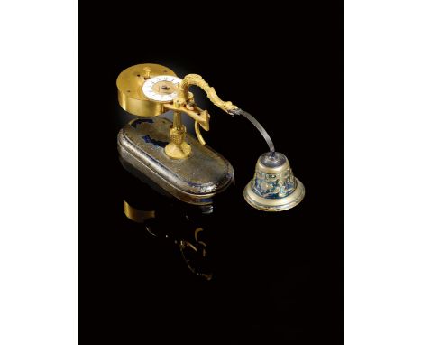 An early 19th century ormolu and lacquer table alarm, with niello style decoration, with an eagle head suspending a bell, the