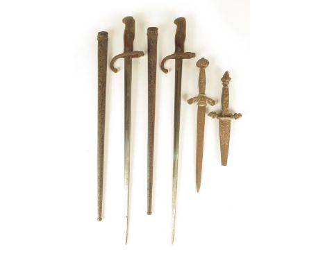 A French bayonet, the steel blade marked Mfe d'Ormes de St Etienne Mai 1876, with scabbard, 66cm long, a similar bayonet mark