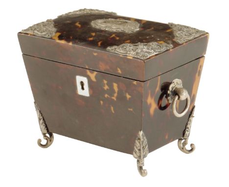 λ An Edwardian tortoiseshell and silver mounted tea caddy, of sarcophagus shape, the interior with a single lidded compartmen