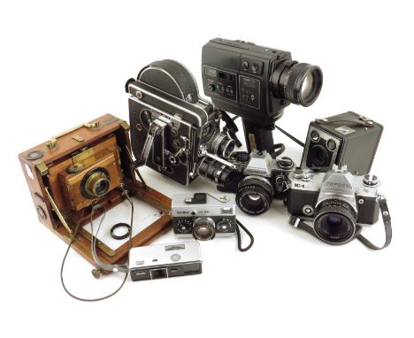 A small collection of photographic equipment, comprising: an early 20th century French Photo-Hall folding perfect camera, a B