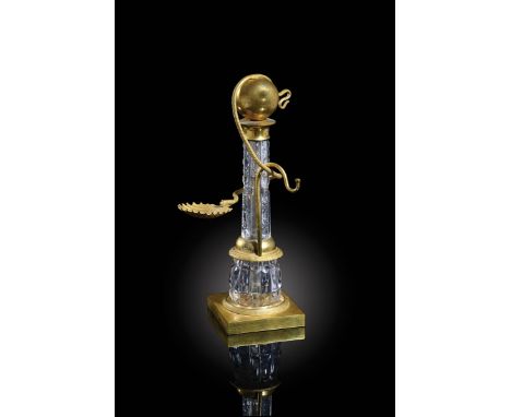 A Restauration ormolu and cut glass watch and ring holder, in the form of a tapering column, the Baccarat glass stem with a b